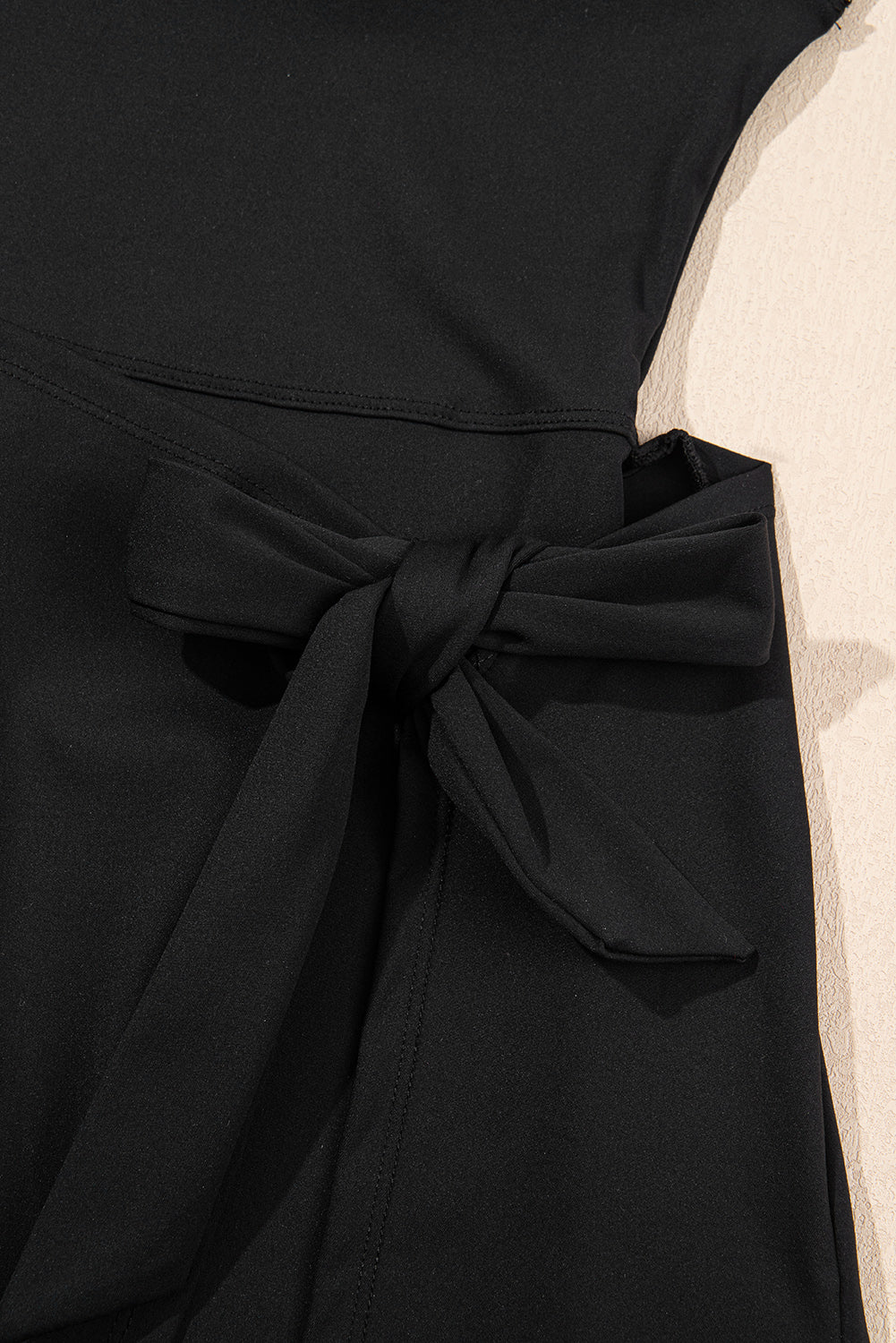 Black Sleeveless Knot Skirt Hem Sports Romper